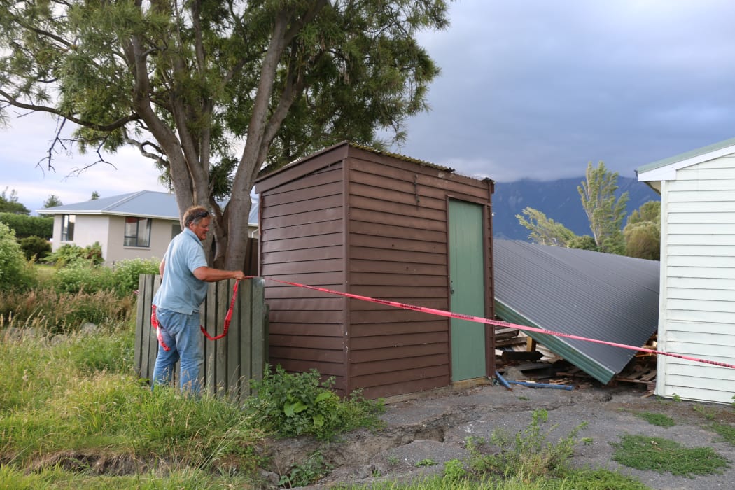 Tony Guthrie at his earthquake-damaged home beside Lyell Creek.