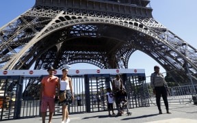 Security gates were put up at the Eiffel Tower last year. A 2.5 meter-high bullet-proof glass is to be set around the Eiffel Tower to protect it and secure its access later in 2017.