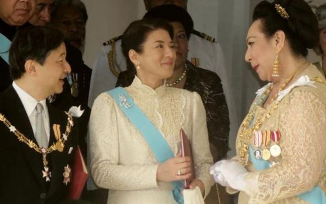 Tonga's Princess Pilolevu speaks with Crown Prince Naruhito and Crown Princess Masako of Japan at the coronation of King Tupou VI