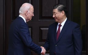 US President Joe Biden greets Chinese President Xi Jinping before a meeting during the Asia-Pacific Economic Cooperation (APEC) Leaders' week in Woodside, California on November 15, 2023. Biden and Xi will try to prevent the superpowers' rivalry spilling into conflict when they meet for the first time in a year at a high-stakes summit in San Francisco on Wednesday. With tensions soaring over issues including Taiwan, sanctions and trade, the leaders of the world's largest economies are expected to hold at least three hours of talks at the Filoli country estate on the city's outskirts.