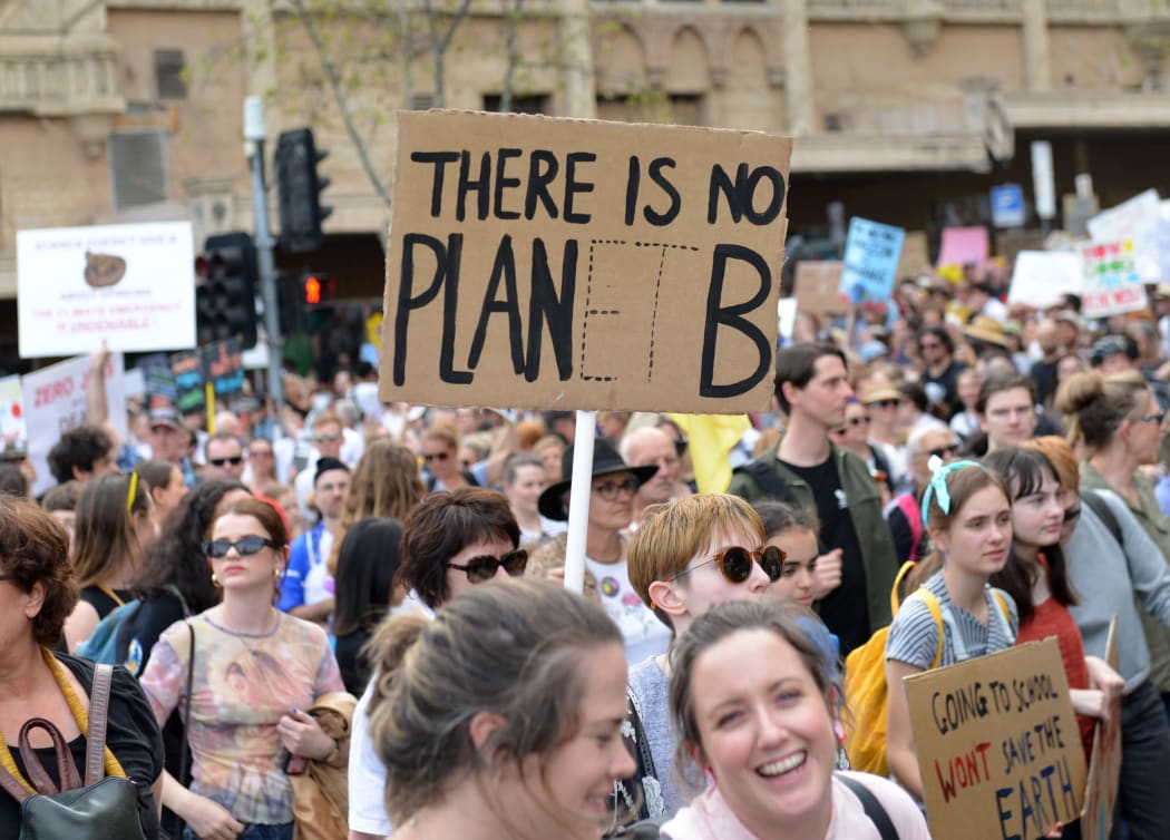 Student demonstrators and thousands of environmentalists gather holding banners for the Climate Strike to draw the attention of government on global warming and climate change, in Melbourne, Australia on September 20, 2019.