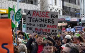 Families and children were out in force on Queen Street to support teachers on strike.