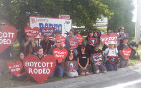 About 50 people are protesting outside the Warkwarth rodeo.