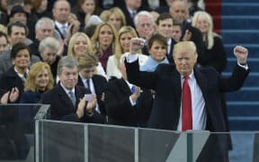 Donald Trump acknowledges the crowd during his swearing-in ceremony.