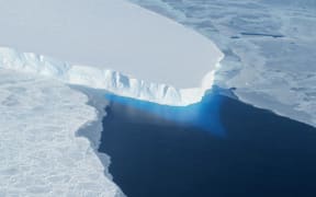 This undated photo courtesy of NASA shows Thwaites Glacier in Western Antarctica.   A major ice sheet in western Antarctica is melting, and its collapse is predicted to raise global sea level nearly two feet (61 centimeters), scientists said May 12, 2014.